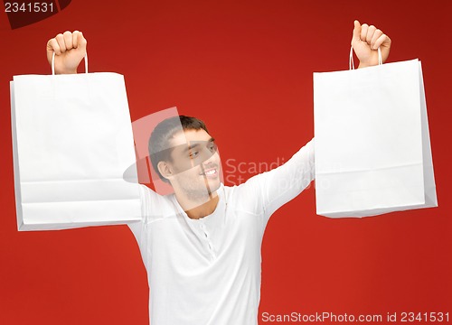 Image of man with shopping bags