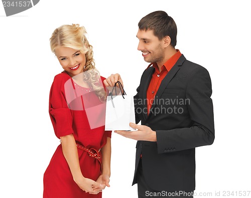 Image of man and woman with present