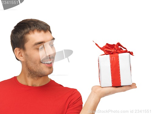 Image of handsome man with a gift