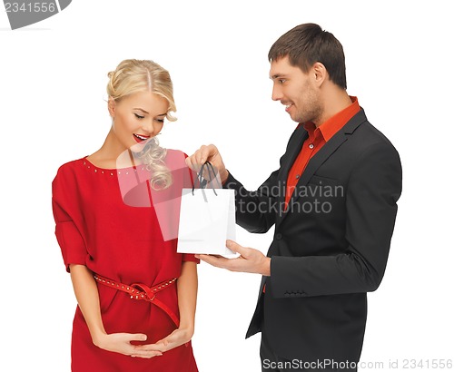 Image of man and woman with present