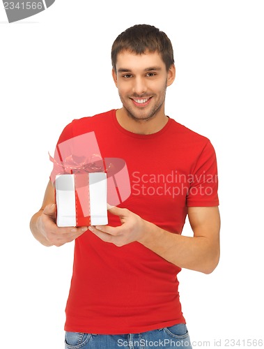 Image of handsome man with a gift