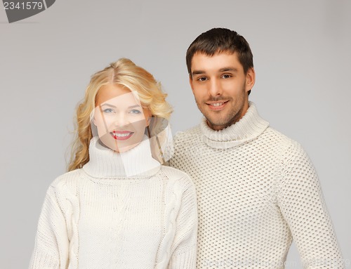 Image of family couple in a sweaters
