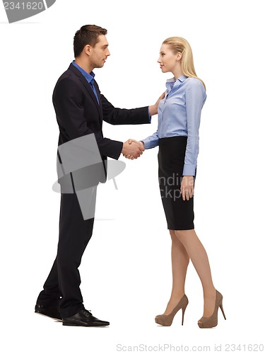 Image of man and woman shaking their hands