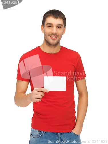 Image of handsome man with note card