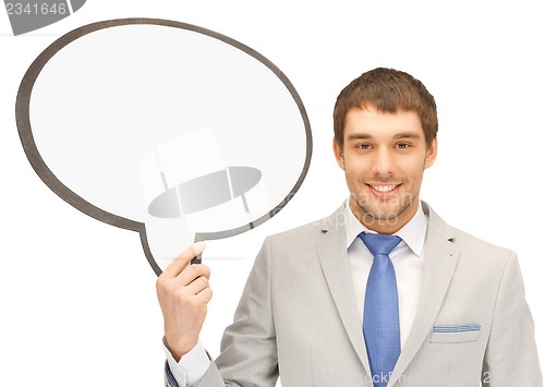 Image of businessman with blank text bubble