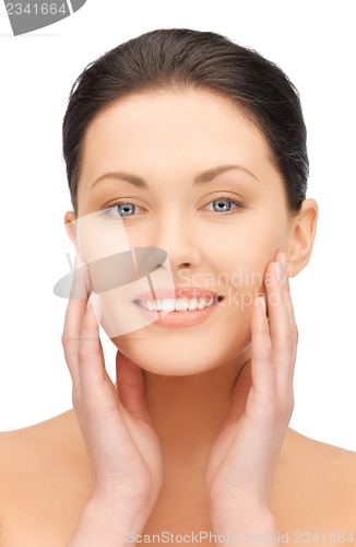 Image of face and hands of beautiful woman