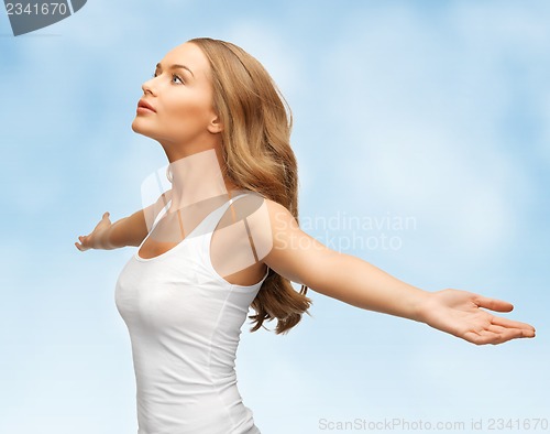 Image of woman spreading hands