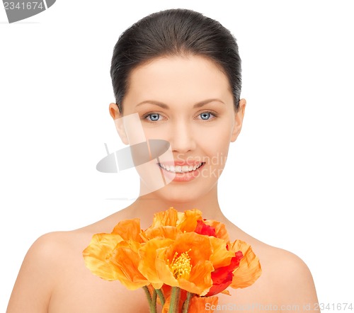 Image of woman with red flowers