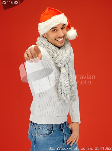 Image of handsome man in christmas hat