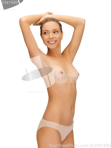 Image of beautiful topless woman in panties