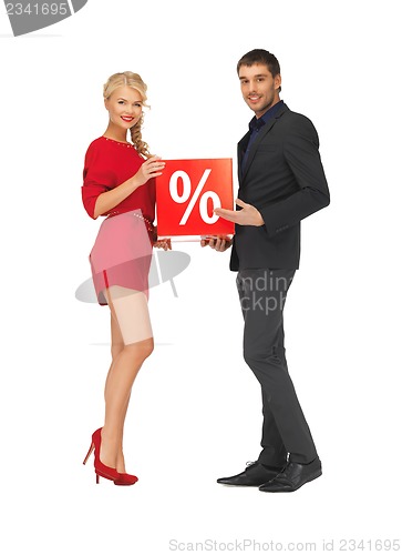 Image of man and woman with percent sign