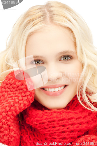 Image of beautiful woman in mittens