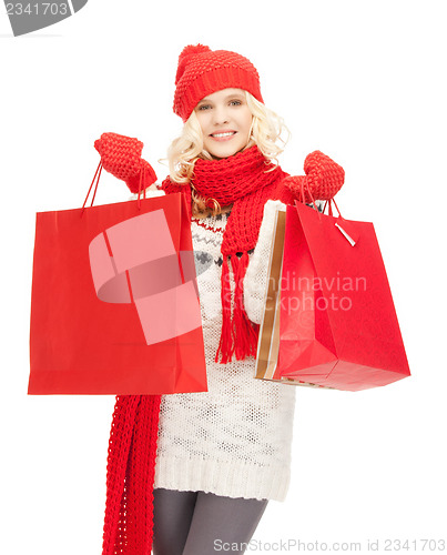 Image of young girl with shopping bags