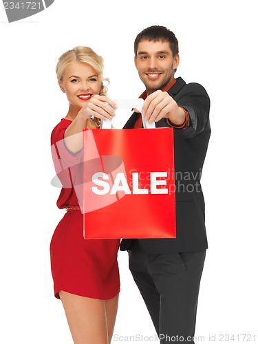 Image of man and woman with shopping bag