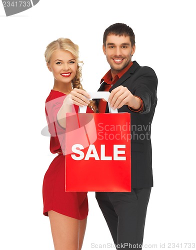 Image of man and woman with shopping bag