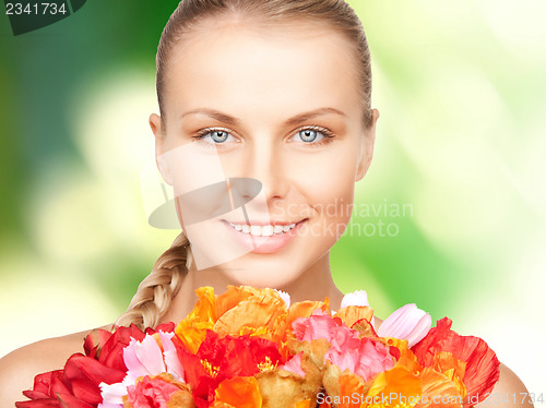 Image of lovely woman with red flowers