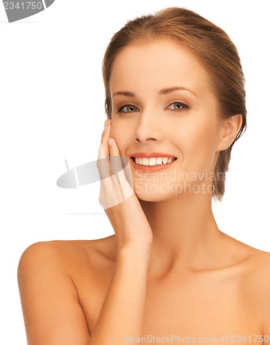 Image of face and hands of beautiful woman