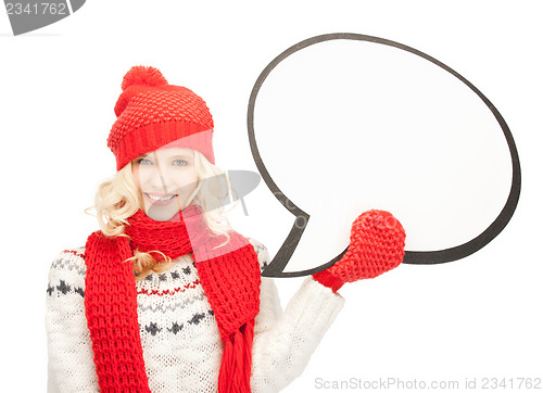 Image of smiling woman with blank text bubble