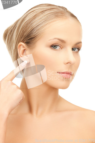 Image of woman pointing to ear