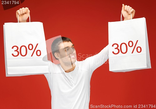 Image of man with shopping bags