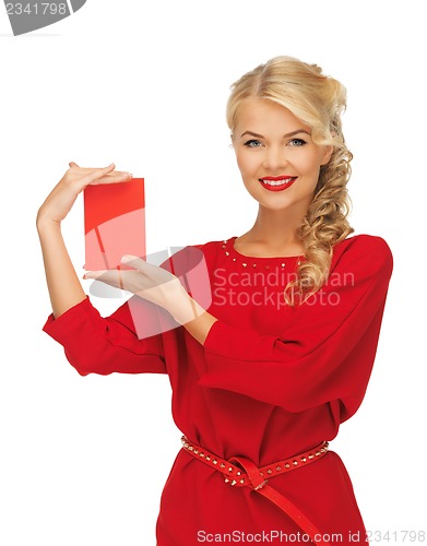Image of lovely woman in red dress with note card