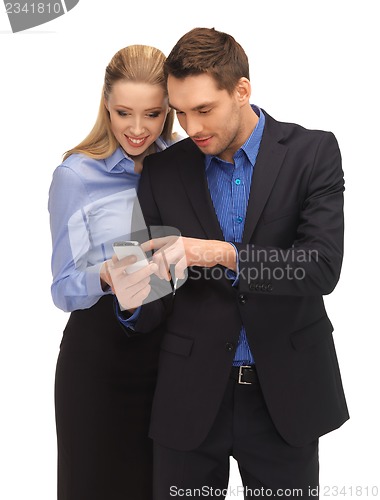 Image of man and woman reading sms