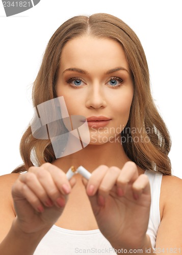Image of woman with broken cigarette