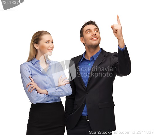 Image of man and woman pointing their fingers