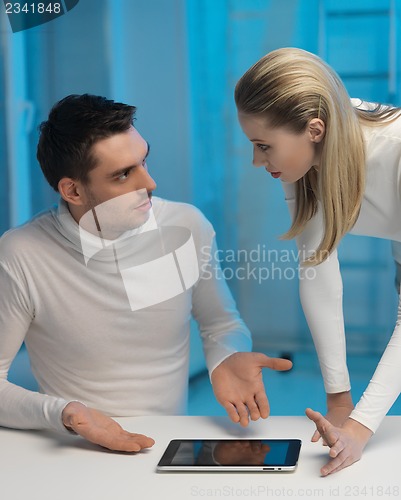 Image of man and woman in laboratory