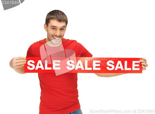 Image of handsome man with sale sign