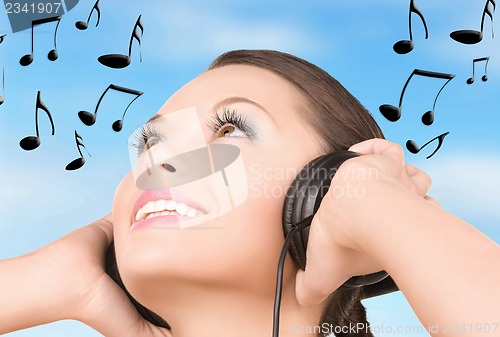 Image of happy woman in headphones