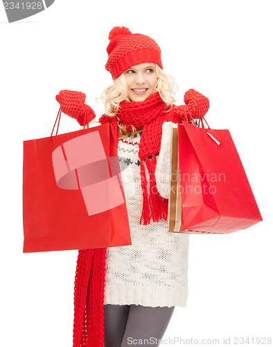 Image of young girl with shopping bags