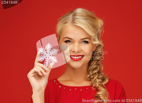 Image of lovely woman in red dress with snowflake