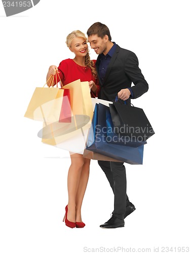 Image of man and woman with shopping bags