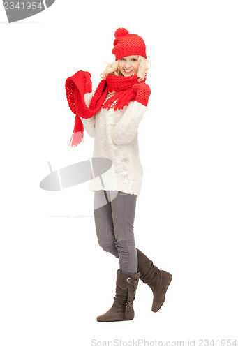 Image of beautiful woman in hat, muffler and mittens