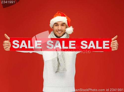 Image of handsome man in christmas hat