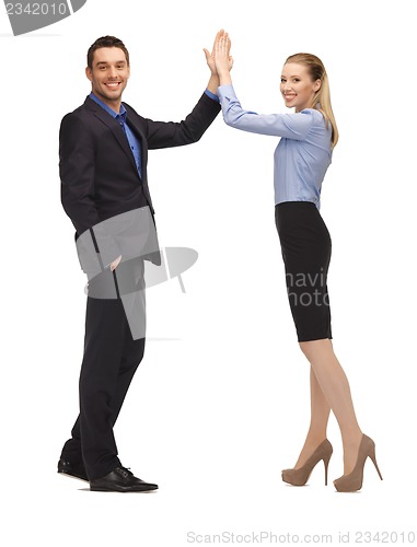 Image of man and woman giving a high five