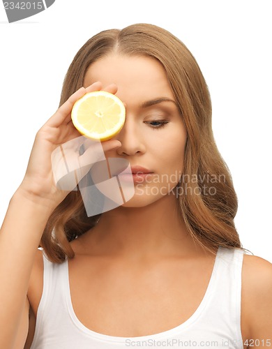 Image of woman with lemon slice