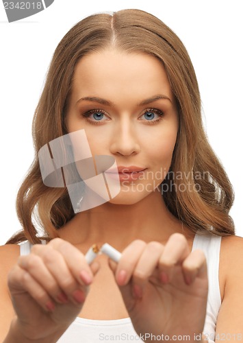 Image of woman with broken cigarette