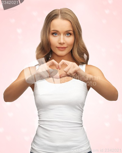 Image of woman forming heart shape