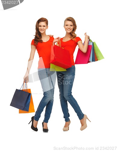 Image of two teenage girls with shopping bags