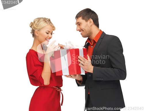 Image of man and woman with present