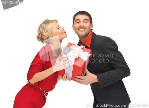 Image of man and woman with present