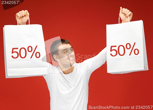 Image of man with shopping bags