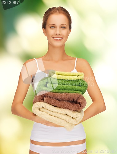 Image of lovely woman with towels