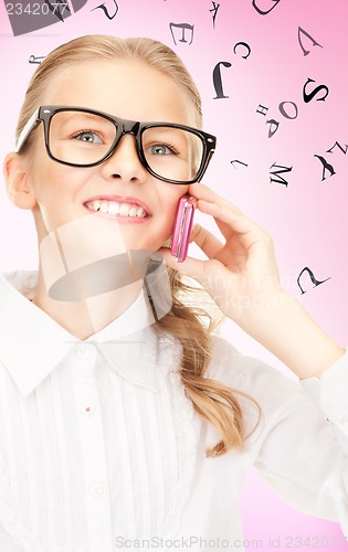 Image of happy girl with cell phone