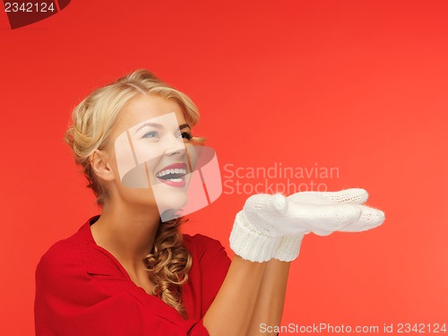 Image of woman holding something on the palms