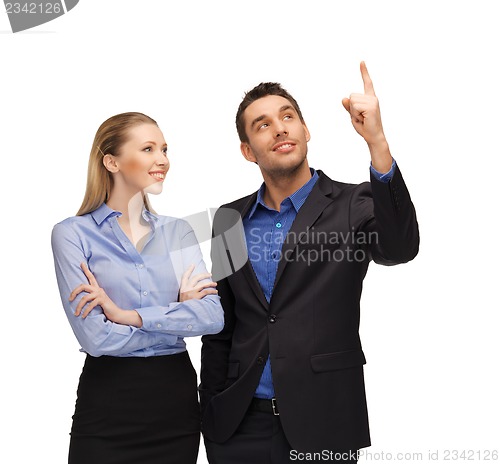 Image of man and woman pointing their fingers