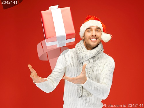 Image of handsome man in christmas hat