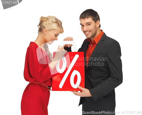 Image of man and woman with shopping bag